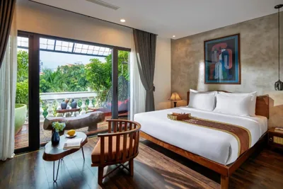 Junior Suite Studio avec baignoire, balcon et vue sur la montagne — Draha Halong Hotel - Serenity, Charm and Nature - Preferred by Western Travelers